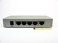 Switch z 5 gniazdami 8P8C.